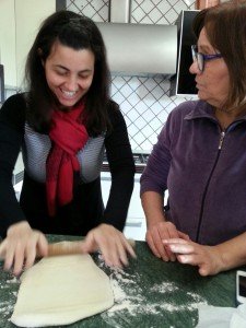 Mariacristina learning from her mummy how to prepare impasto madre...