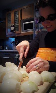 Mariacristina wearing goggles whole chopping onions for ragu alla genivese