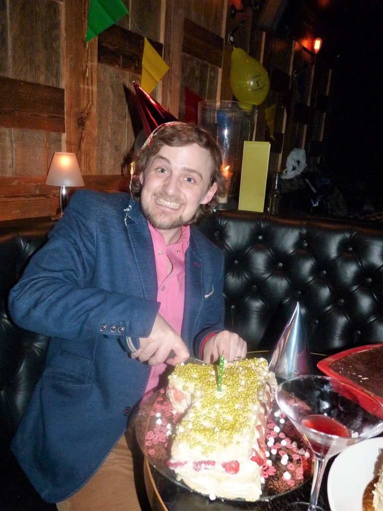 George cutting his 1 shaped millefoglie alle fragole