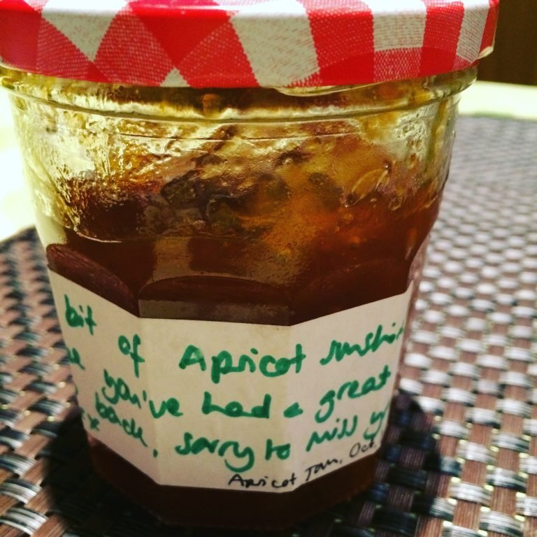 Jar of apricot jam for crostata alla marmellata